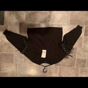 Zara sweater with tassels.